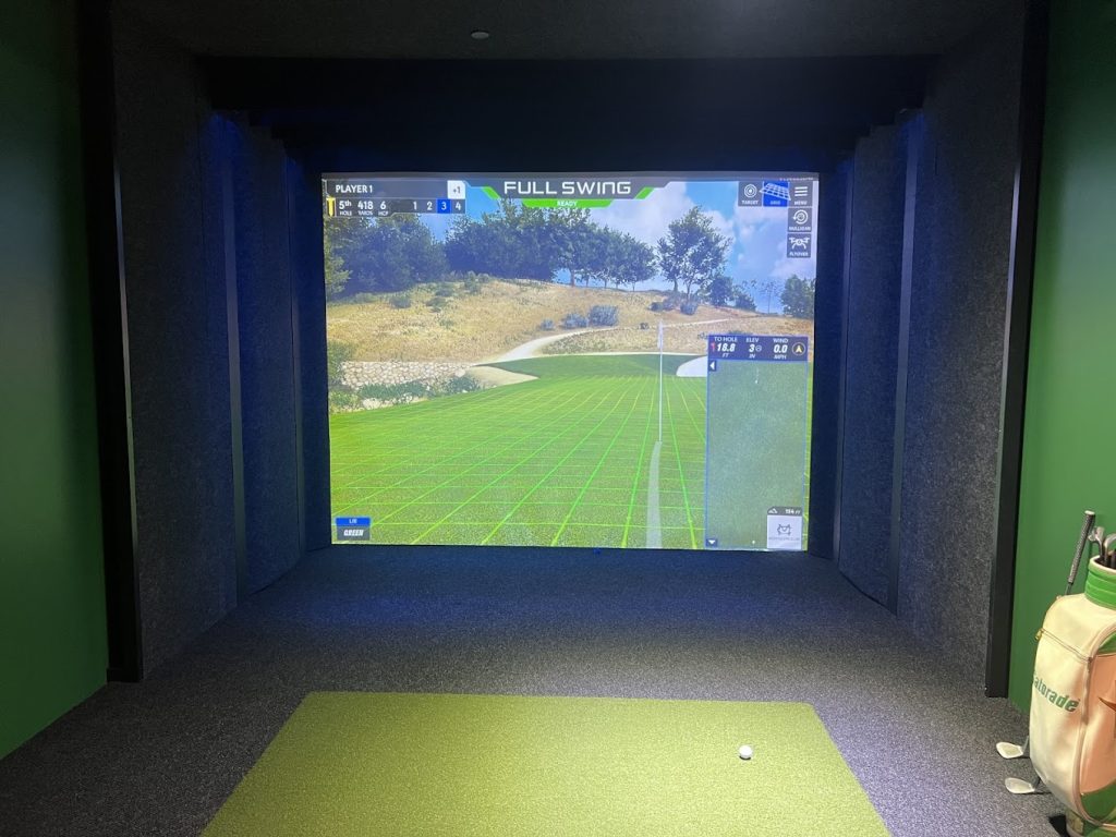 Full Swing simulator screen and hitting mat at One Swing Away